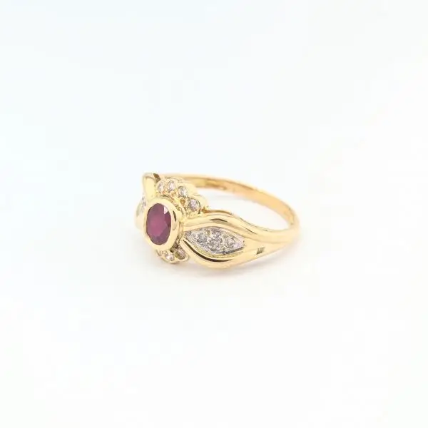 Bague   or jaune diamant et rubis